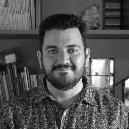 Grayscale photo of a man