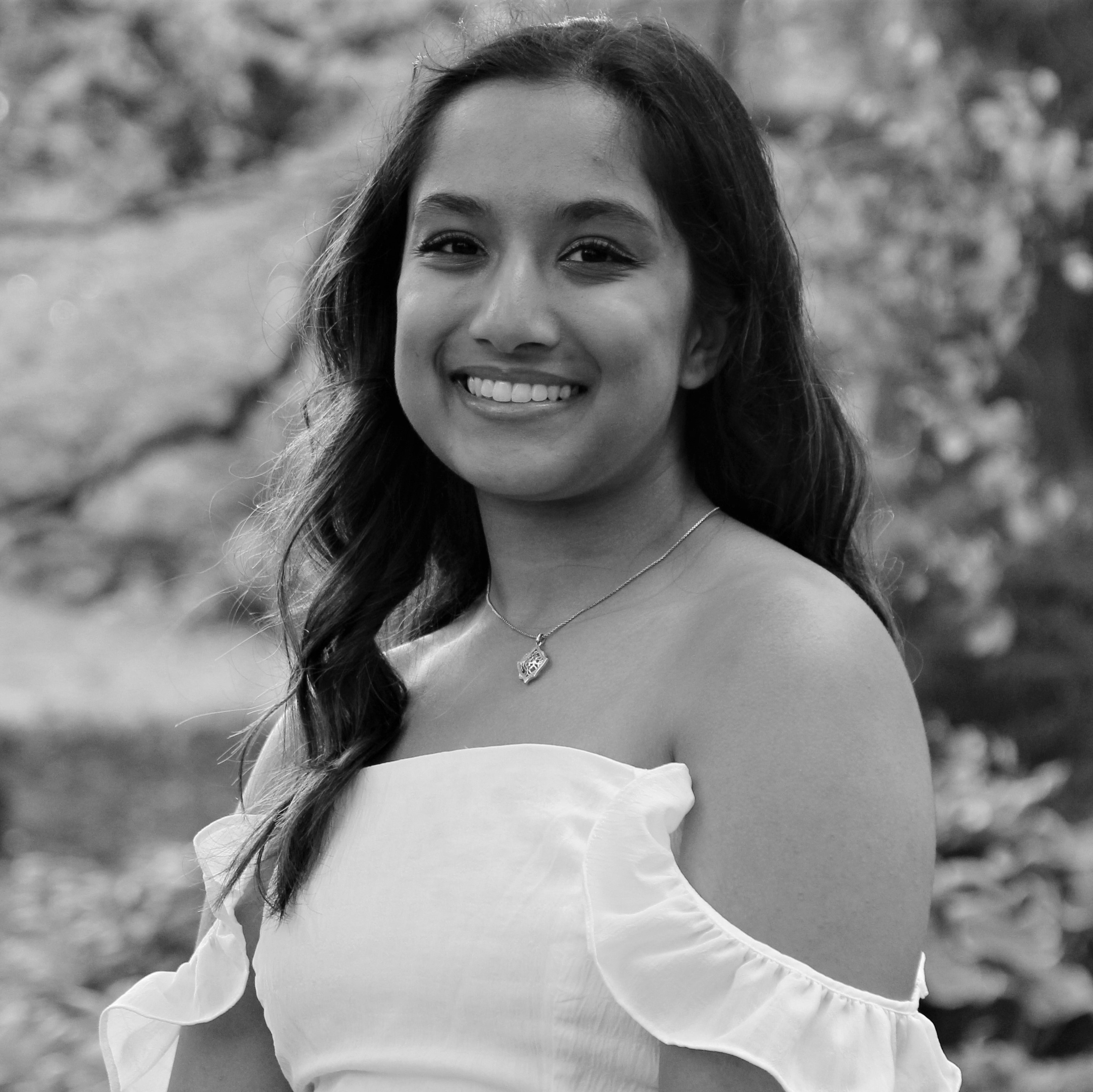 Grayscale photo of a woman
