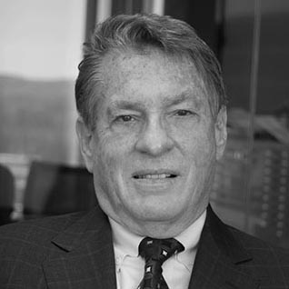 Grayscale photo of a man