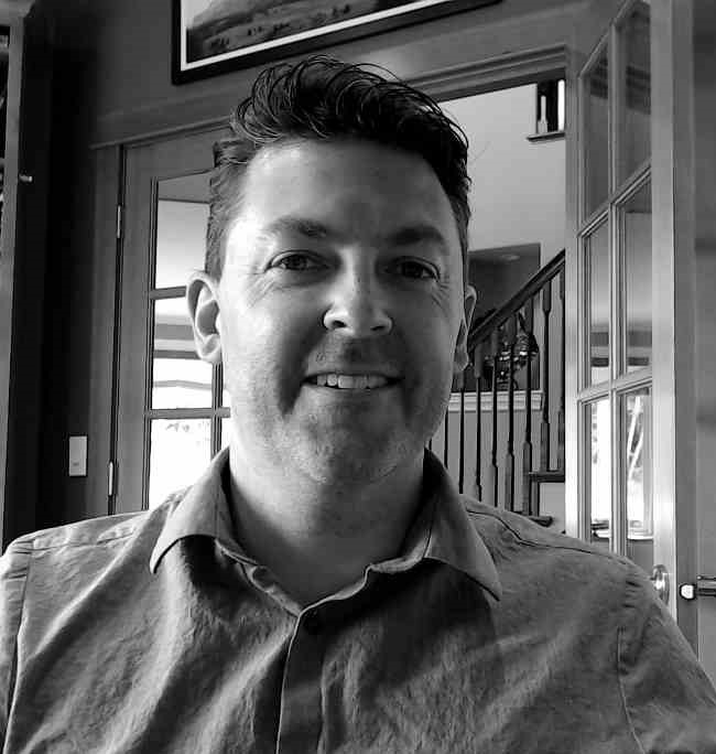 Grayscale photo of a man